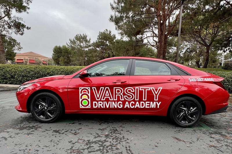 Orange County Cities Serviced by VDA Driving School a Training Vehicle Parked in a Parking Lot