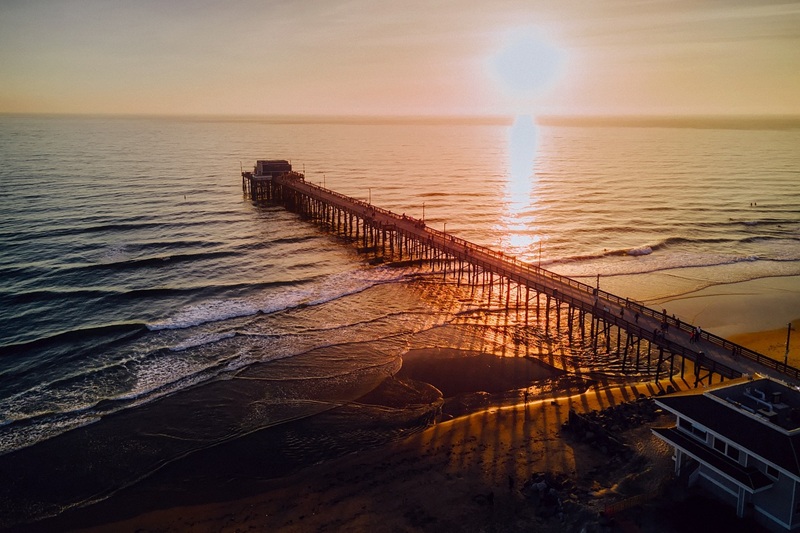 Spring Break Destinations in Southern California View of a Pier Jetting Out into the Ocean From Newport Beach