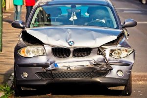 What to do When You Get in an Accident View of a BMW with a Crumpled Hood From an Accident